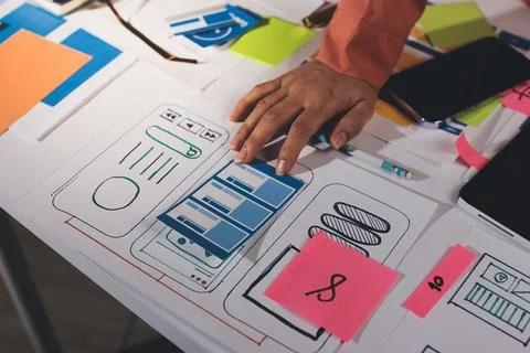 Team of UI UX web designer are working together to develop mobile responsiv.. Stock Photos
