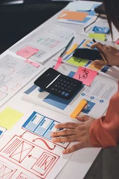 Team of UI UX web designer are working together to develop mobile responsiv.. Stock Photos