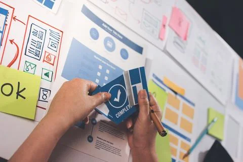 Team of UI UX web designer are working together to develop mobile responsiv.. Stock Photos