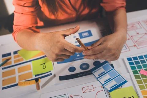Team of UI UX web designer are working together to develop mobile responsiv.. Stock Photos