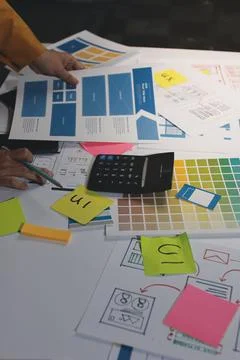 Team of UI UX web designer are working together to develop mobile responsiv.. Stock Photos
