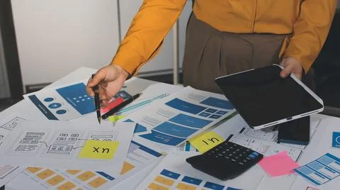 Team of UI UX web designer are working together to develop mobile responsiv.. Stock Photos