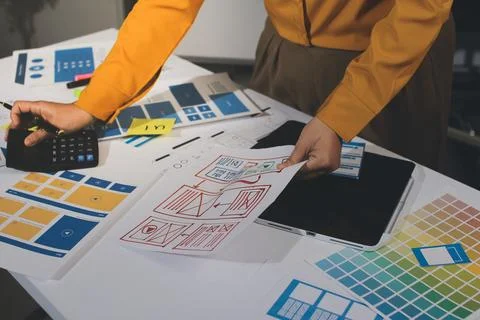 Team of UI UX web designer are working together to develop mobile responsiv.. Foto stock
