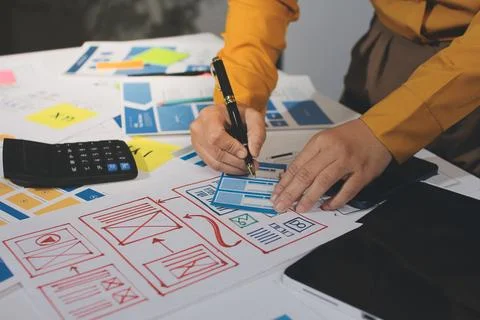 Team of UI UX web designer are working together to develop mobile responsiv.. Stock Photos