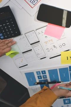 Team of UI UX web designer are working together to develop mobile responsiv.. Stock Photos