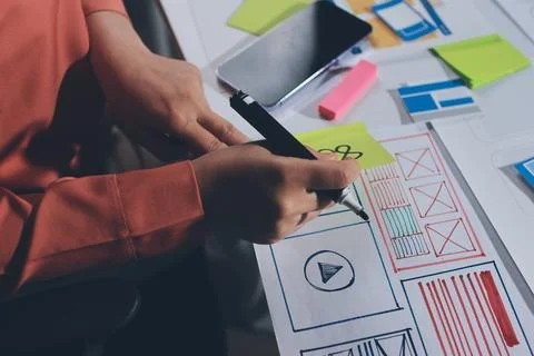 Team of UI UX web designer are working together to develop mobile responsiv.. 스톡 사진
