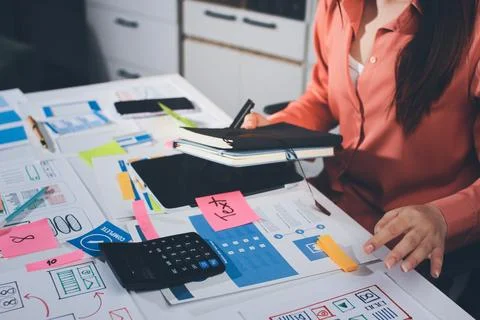 Team of UI UX web designer are working together to develop mobile responsiv.. 写真素材