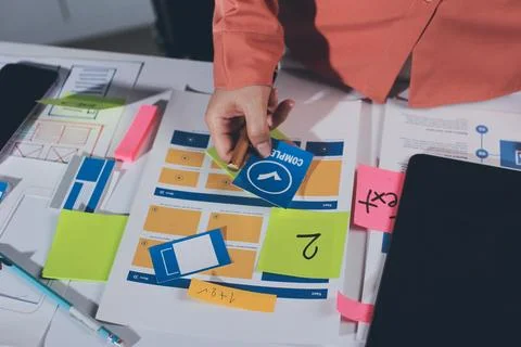 Team of UI UX web designer are working together to develop mobile responsiv.. Stock Photos