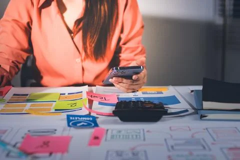 Team of UI UX web designer are working together to develop mobile responsiv.. Stock Photos