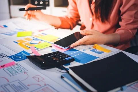 Team of UI UX web designer are working together to develop mobile responsiv.. Stock Photos