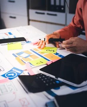 Team of UI UX web designer are working together to develop mobile responsiv.. Stock Photos