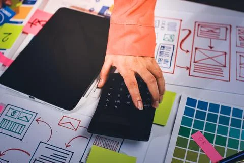 Team of UI UX web designer are working together to develop mobile responsiv.. Stock Photos