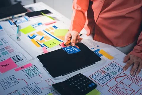 Team of UI UX web designer are working together to develop mobile responsiv.. Stock Photos