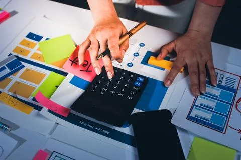 Team of UI UX web designer are working together to develop mobile responsiv.. Stock Photos