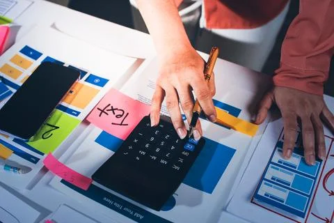 Team of UI UX web designer are working together to develop mobile responsiv.. Stock Photos