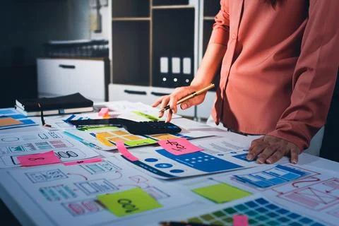 Team of UI UX web designer are working together to develop mobile responsiv.. Stock Photos