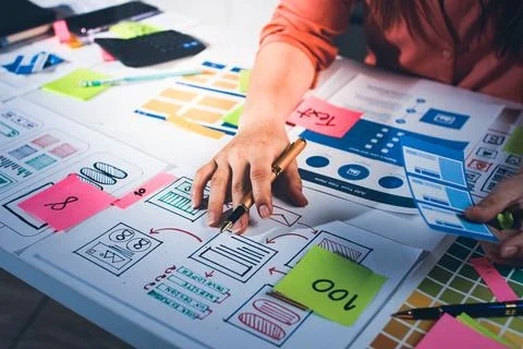 Team of UI UX web designer are working together to develop mobile responsiv.. Stock Photos
