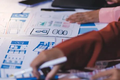 Team of UI UX web designer are working together to develop mobile responsiv.. 스톡 사진