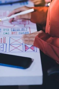 Team of UI UX web designer are working together to develop mobile responsiv.. Stock Photos