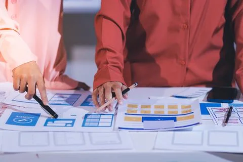 Team of UI UX web designer are working together to develop mobile responsiv.. Stock Photos