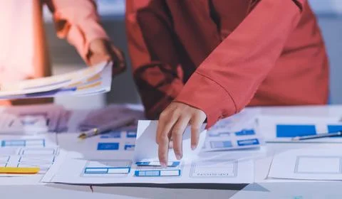 Team of UI UX web designer are working together to develop mobile responsiv.. Stock Photos