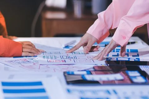 Team of UI UX web designer are working together to develop mobile responsiv.. Stock Photos