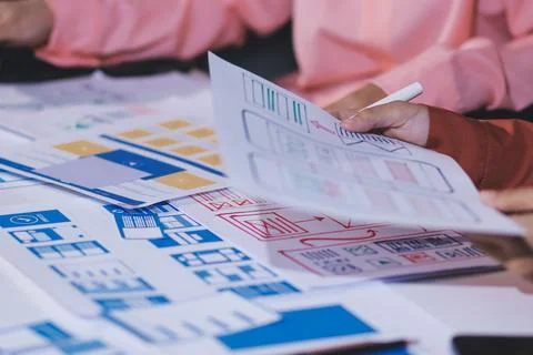 Team of UI UX web designer are working together to develop mobile responsiv.. Stock Photos