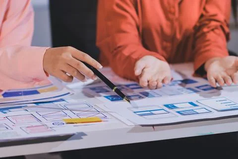 Team of UI UX web designer are working together to develop mobile responsiv.. Stock Photos