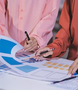 Team of UI UX web designer are working together to develop mobile responsiv.. Stock Photos