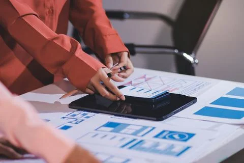 Team of UI UX web designer are working together to develop mobile responsiv.. Stock Photos