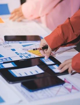 Team of UI UX web designer are working together to develop mobile responsiv.. Stock Photos