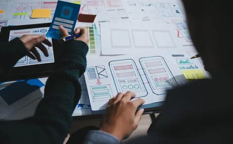 Team of UI UX web designer are working together to develop mobile responsiv.. Foto stock