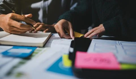 Team of UI UX web designer are working together to develop mobile responsiv.. Stock Photos