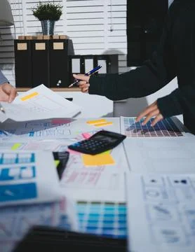 Team of UI UX web designer are working together to develop mobile responsiv.. Stock Photos
