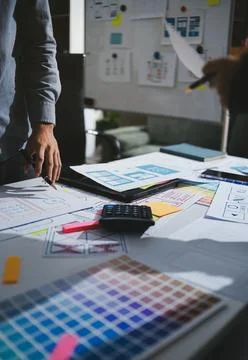 Team of UI UX web designer are working together to develop mobile responsiv.. Stock Photos