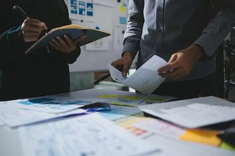 Team of UI UX web designer are working together to develop mobile responsiv.. Stock Photos