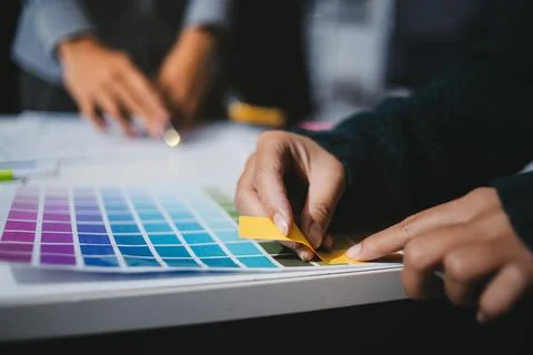 Team of UI UX web designer are working together to develop mobile responsiv.. Stock Photos
