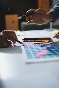 Team of UI UX web designer are working together to develop mobile responsiv.. Stock Photos
