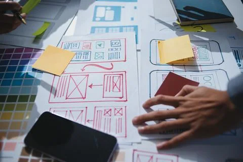 Team of UI UX web designer are working together to develop mobile responsiv.. Stock Photos