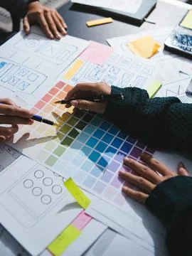 Team of UI UX web designer are working together to develop mobile responsiv.. Stock Photos