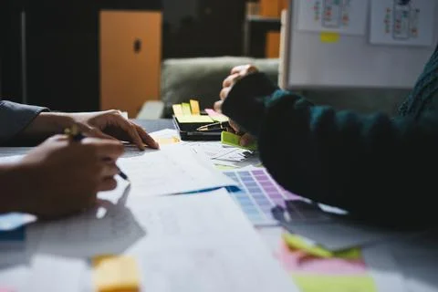 Team of UI UX web designer are working together to develop mobile responsiv.. Stock Photos
