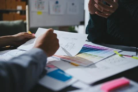 Team of UI UX web designer are working together to develop mobile responsiv.. Stock Photos