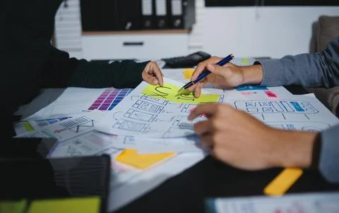 Team of UI UX web designer are working together to develop mobile responsiv.. Stock Photos
