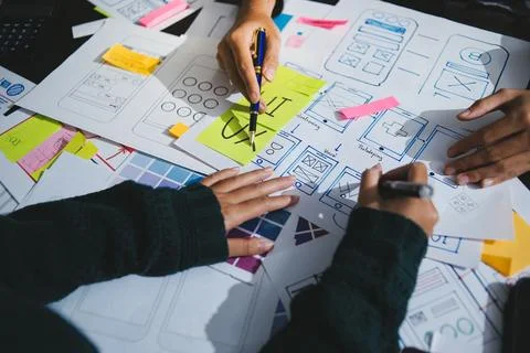 Team of UI UX web designer are working together to develop mobile responsiv.. Stock Photos