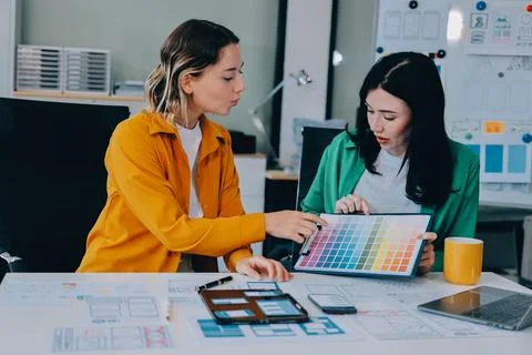 Team of UI UX web designer are working together to develop mobile responsiv.. Stock Photos