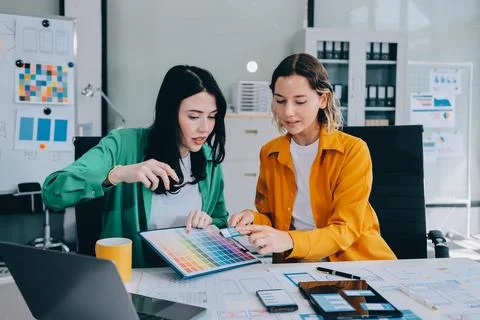 Team of UI UX web designer are working together to develop mobile responsiv.. Stock Photos