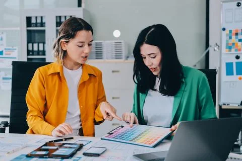 Team of UI UX web designer are working together to develop mobile responsiv.. Stock Photos