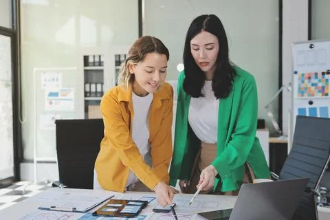Team of UI UX web designer are working together to develop mobile responsiv.. Stock Photos