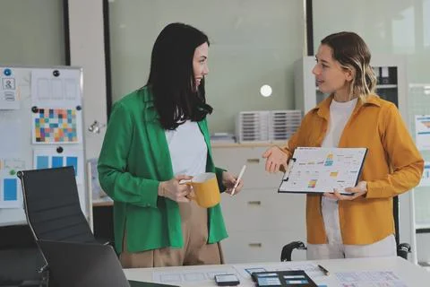 Team of UI UX web designer are working together to develop mobile responsiv.. Stock Photos