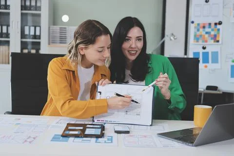 Team of UI UX web designer are working together to develop mobile responsiv.. Stock Photos